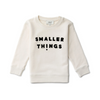 Stylish Bone Colored Sweatshirt with Smaller Things Logo. 100% Organic Cotton. Crewneck for Young Boys and Girls. Fashionable and Cozy to Wear. Velvet Lettering Logo.
