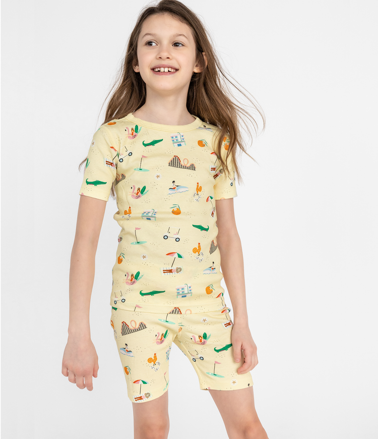 Child Posing in Smaller Things Short Pajama  Set - Fun Florida-themed print on 100% organic cotton short sleeve top and bottom