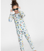 Child Posing in Smaller Things Long Sleeved Pajama Set - NYC-themed print on 100% organic cotton top and bottom