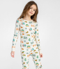 Adorable Young Girl with Off-White with Fun San Fransisco-themed Graphics, Long Sleeves Top and Pants, Comfortable and Cozy Sleepwear for Kids. 100% Organic Cotton. Long John Two-Piece Set.