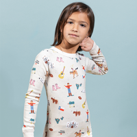 Young Girl Wearing Top From Fashionable Texas Themed Long John Set. 100% Organic Cotton and Ethically Made. Ribbed Cuffs.